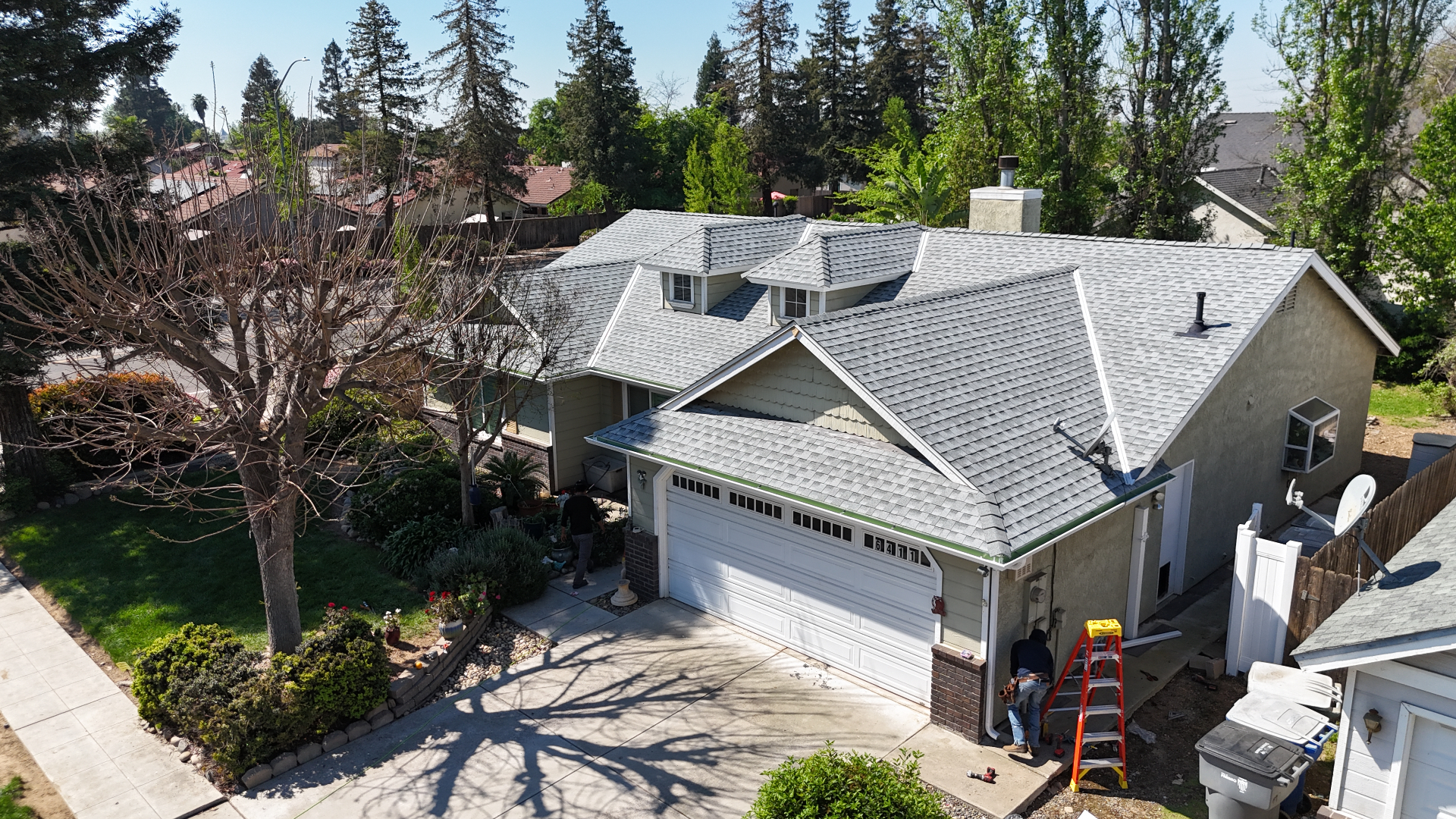 Premium luxury home with expertly crafted roof at golden hour